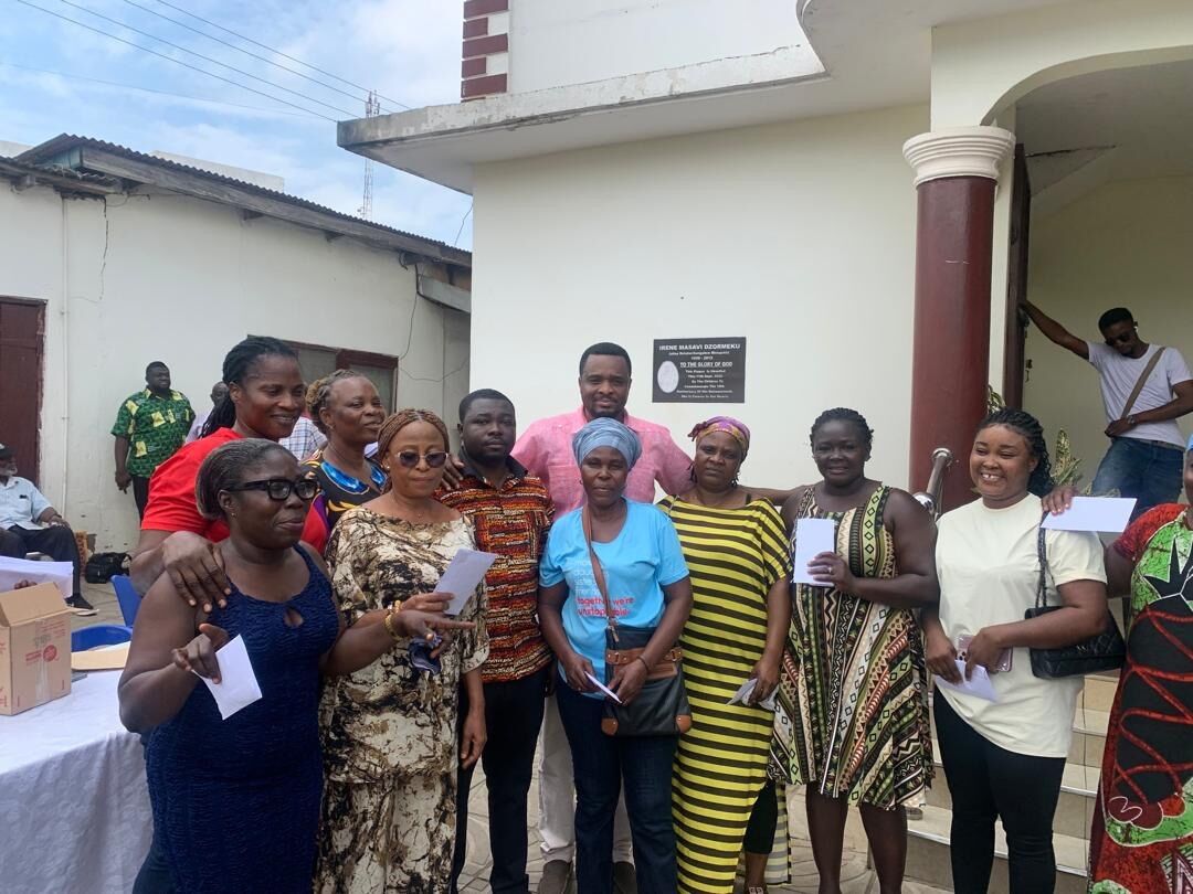 Beneficiaries with their GHS 1,000 cash support for petty trade businesses