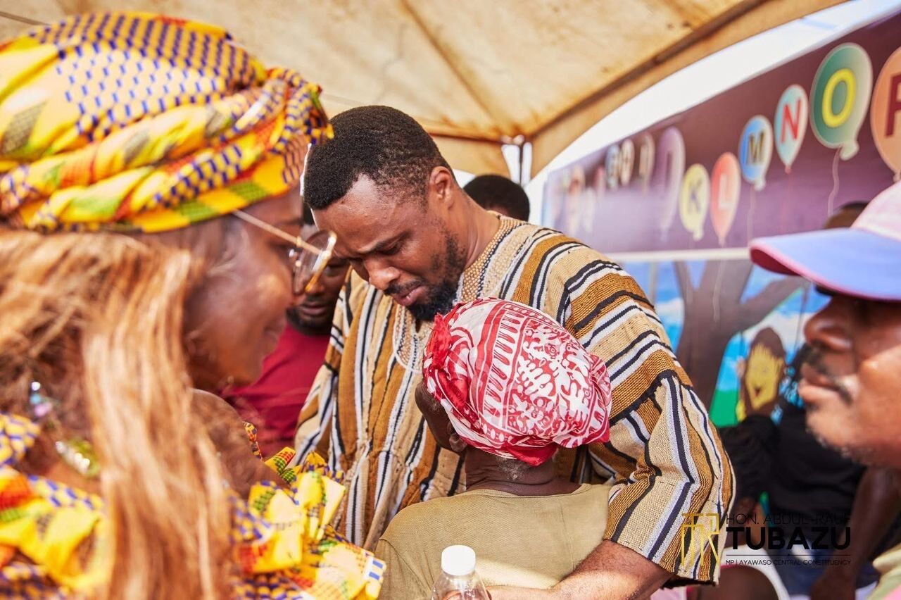 The MP with residents at the free health screening at Atta Nii Park
