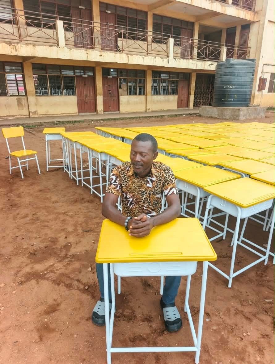 School tables and chairs assembled for distribution to schools in the constituency